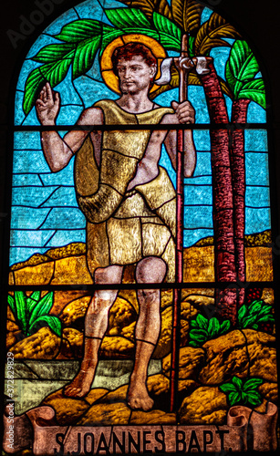 Fényképezés coloured stained glass of Saint John the Baptist