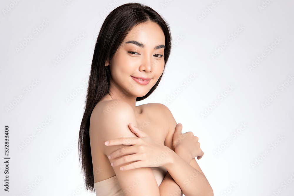Beautiful Young asian Woman with Clean Fresh Skin, on white background, Face care, Facial treatment, Cosmetology, beauty and spa, Asian women portrait Beautiful Young asian Woman with Clean Fresh Skin, on white background, Face care, Facial treatment, Cosmetology, beauty and spa, Asian women portrait