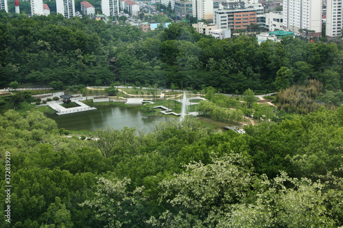 SEOUL, SOUTH KOREA    Aerial view of Seoul, park and lake and forest view . © binimin