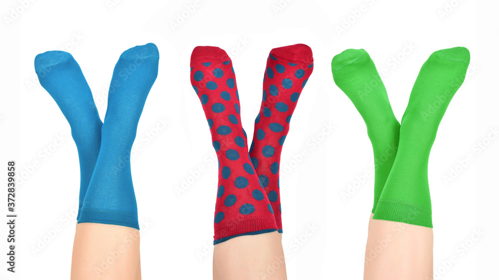 Woman in blue socks isolated on white background. Top view. Woman in blue socks isolated on white background. Top view.