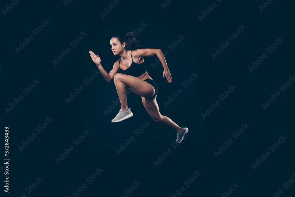 Full length profile photo short sport suit lady sprint run jogger inspired to win race first place isolated black background