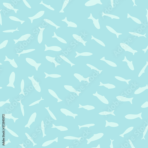Light palette seamless pattern with sea school silhouettes. White fish little ornament with turquoise background.