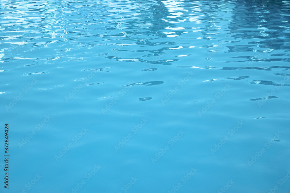 Clear water in swimming pool as background, closeup Clear water in swimming pool as background, closeup