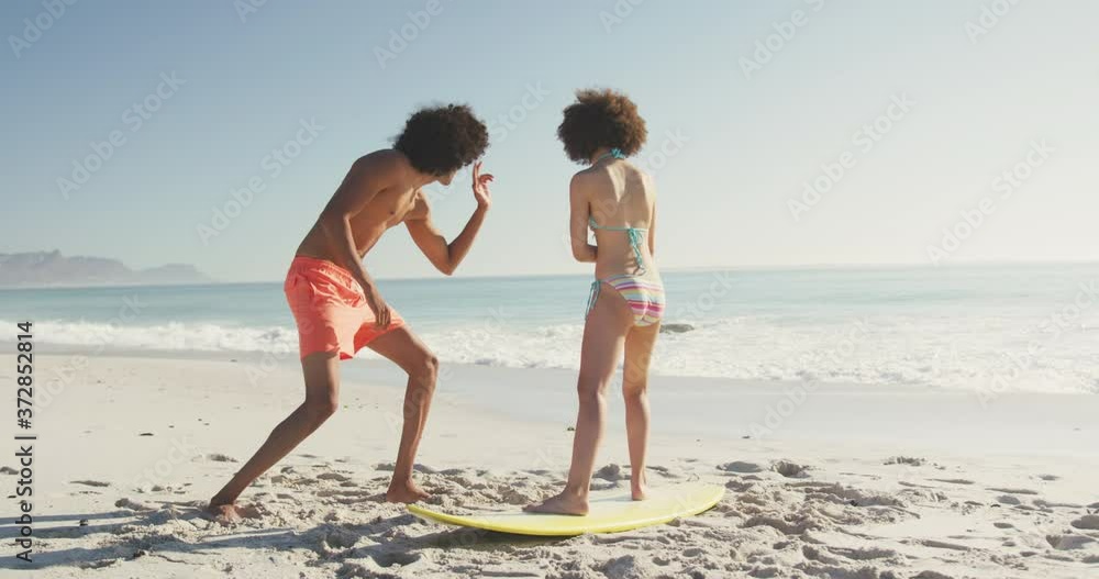 Friends training surf styling on the sand Friends training surf styling on the sand