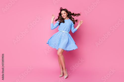 Full length body size view of her she nice-looking attractive lovely pretty stunning cheerful wavy-haired lady posing air blowing mini skirt good mood isolated over pink pastel color background