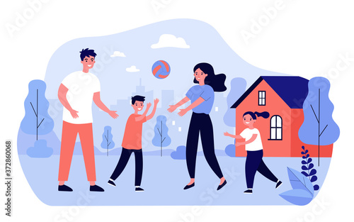 Happy family couple enjoying outdoor activity with kids. Active parents and children playing ball together on backyard of house. For sport, healthy lifestyle, leisure time in summer concepts