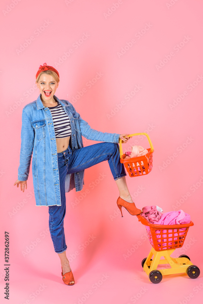 Supermarket. Pin up woman with shopping cart. Woman on shopping. Shopping. Sale. Discount. Black friday. Buying. Buying spree. Supermarket. Pin up woman with shopping cart. Woman on shopping. Shopping. Sale. Discount. Black friday. Buying. Buying spree.