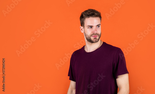 Cool and sexy. copy space. handsome man with bristle. male fashion and beauty. sexy bearded macho. casual style clothing. trendy man wear purple shirt and sunglasses. summer vacation concept