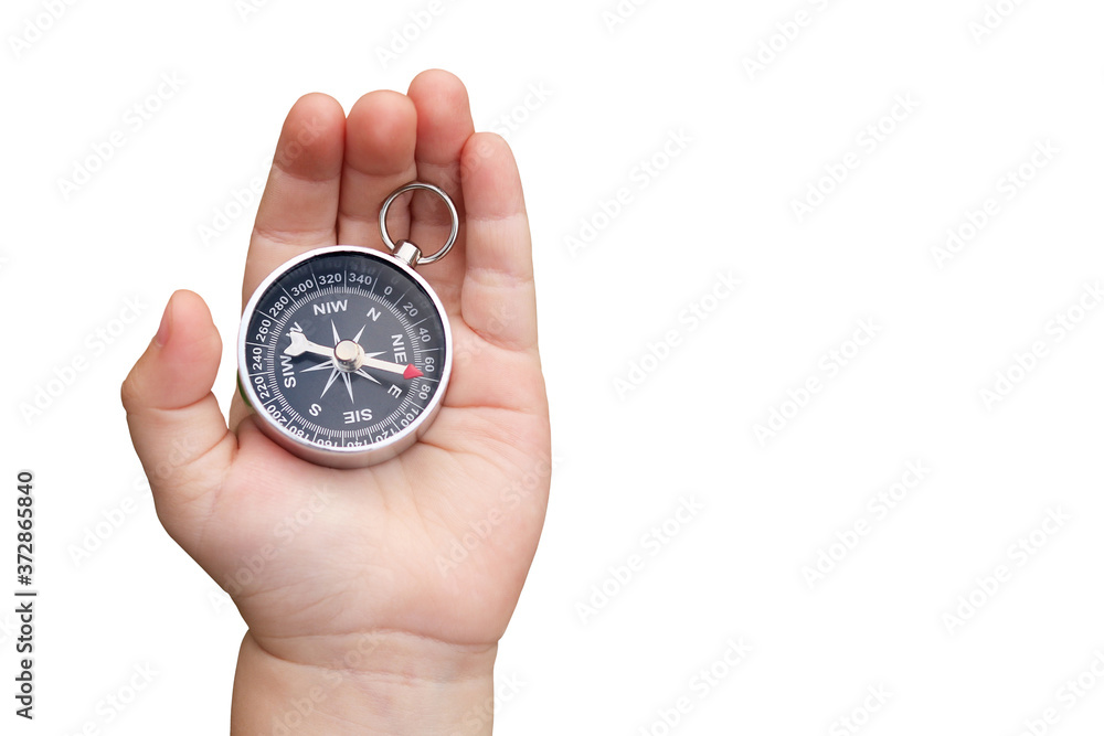 round compass in hand isolated on white background for abstract image with place for text as symbol of tourism with compass, travel with compass and outdoor activities with compass round compass in hand isolated on white background for abstract image with place for text as symbol of tourism with compass, travel with compass and outdoor activities with compass