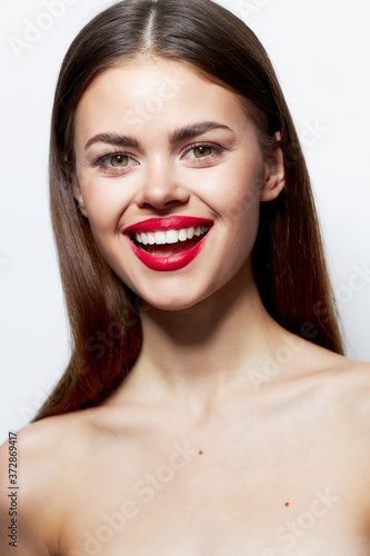 Charming woman Clear skin smile red lips fun spa treatments