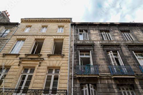 Difference between a wash cleaned house building facades and a dirty one before and after