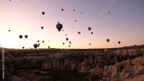 Hot air balloons in the sky at sunrise