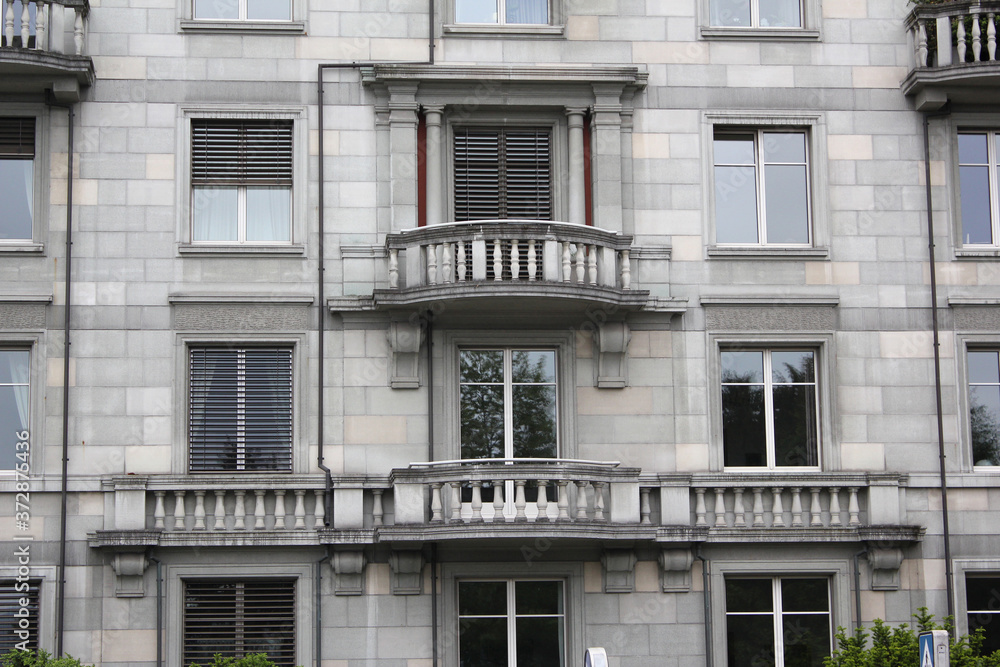 house with typical balconies and windows. interlaken , switzerland house with typical balconies and windows. interlaken , switzerland