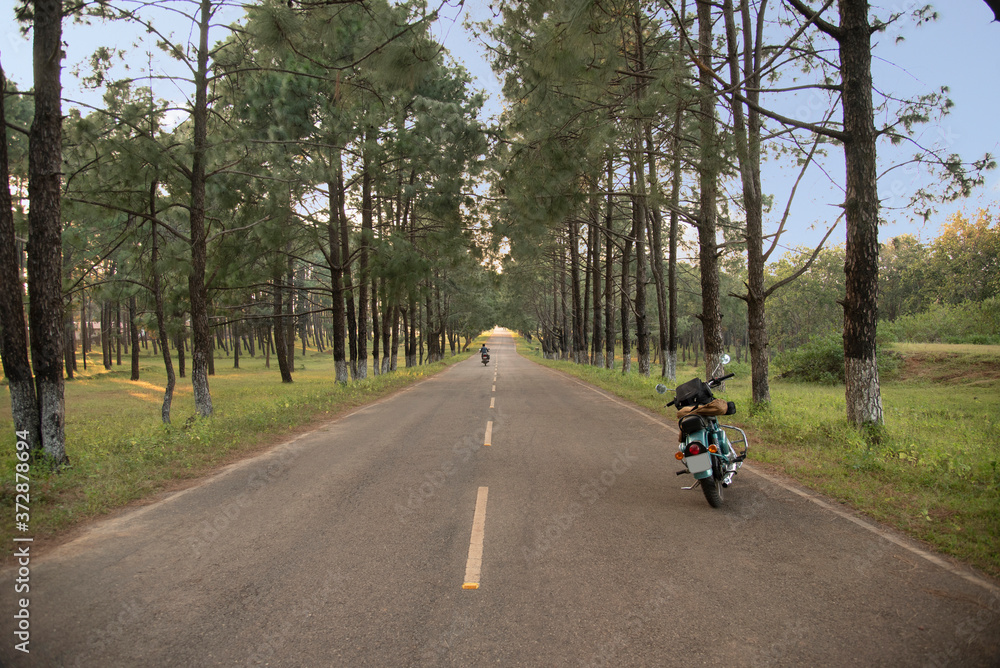 Motorcycle by the roadside on the way to Netarhat, Jharkhand, India Motorcycle by the roadside on the way to Netarhat, Jharkhand, India