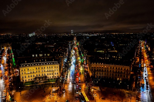 view from Arc de triomphe at night,Photo image a Beautiful panoramic view of Paris Metropolitan City photo