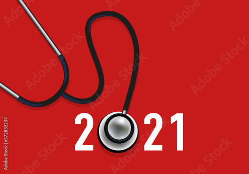 Année 2021 sous le signe de l’épidémie de COVID-19,  avec un stéthoscope pour symboliser le système de santé et les équipes médicales mobilisées contre l’épidémie.