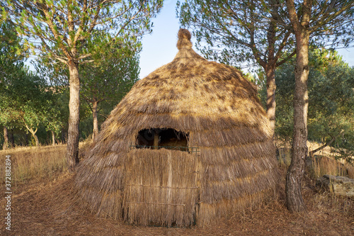 Traditional straw spanish hut. Chock of Tio Cajorro in El Granado, Spain. photo