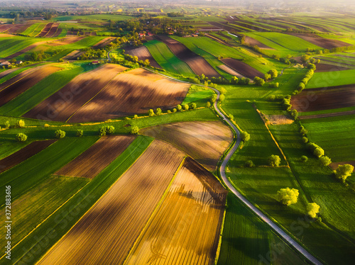 Fotografía Nida Valley called Ponidzie in spring sunset time, drone aerial photos of fields