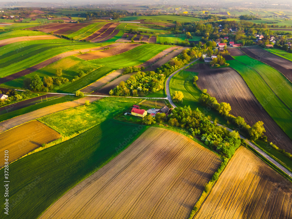 Nida Valley called Ponidzie in spring sunset time, drone aerial photos of fields.