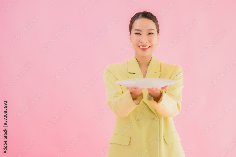 Portrait beautiful young asian business woman with dish or plate Portrait beautiful young asian business woman with dish or plate