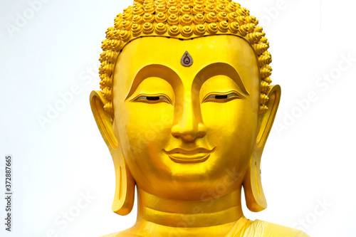Golden face of buddha Buddhist outdoor stucco artwork in Thailand Southeast Asia © neenawat555