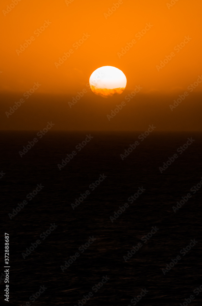 nature poster. orange sunset at the ocean