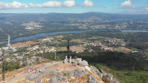 DRONE AERIAL FOOTAGE - The CerLove wooden swing and the Cervo viewpoint is the best known viewpoint of Vila Nova de Cerveira, located next to the sculpture of the deer by the sculptor José Rodrigues. photo