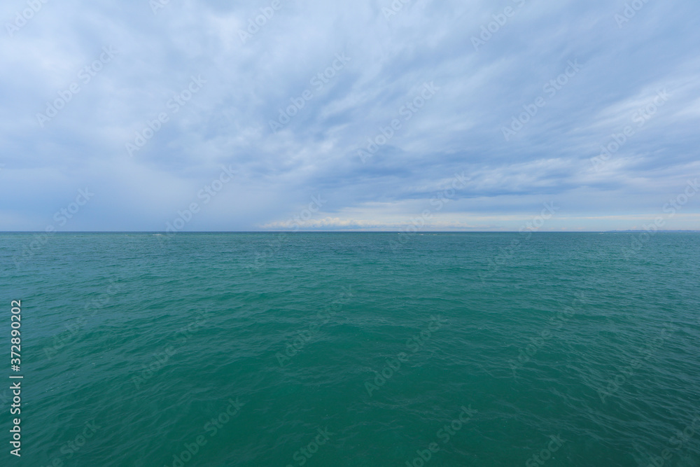 blue sea horizon and blue sky