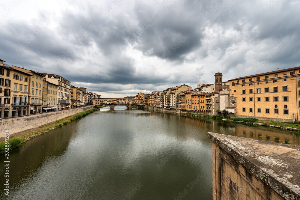 Ponte Vecchio (Old Bridge) and the River Arno view from the bridge of Santa Trinita. Florence downtown, UNESCO world heritage site, Tuscany Italy, Europe