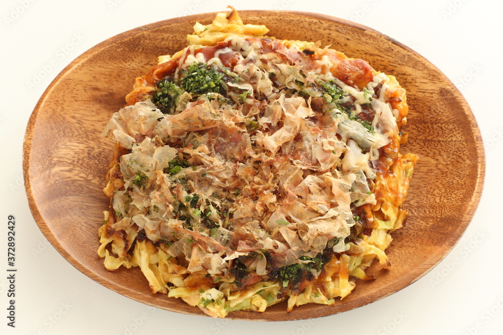 Japanese food, Katsuobushi and Okonomiyaki with copy space Japanese food, Katsuobushi and Okonomiyaki with copy space