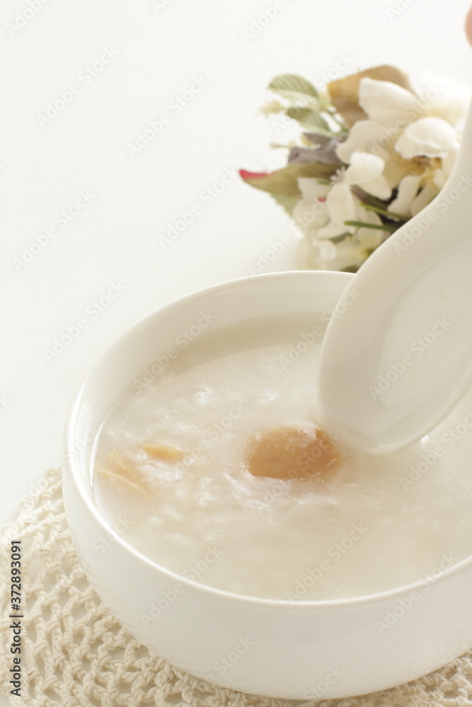 Chinese food, dried scallop in rice porridge for healthy gourmet congee Chinese food, dried scallop in rice porridge for healthy gourmet congee