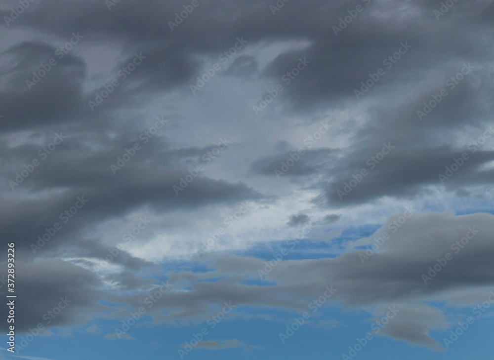 Dark dramatic rainclouds and some blue sky. Netherlands Dark dramatic rainclouds and some blue sky. Netherlands