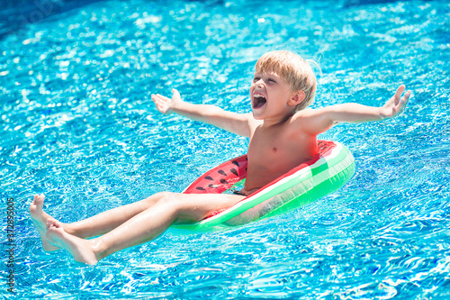 Cute child in the swimming pool