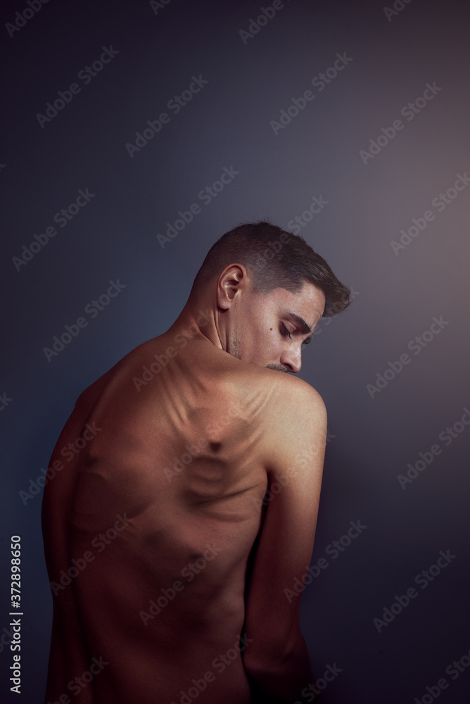 Man with his skin full of faces or spirits Man with his skin full of faces or spirits