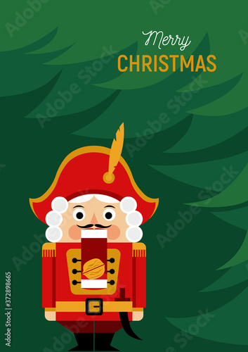 Christmas greeting card with nutcracker under the Christmas tree