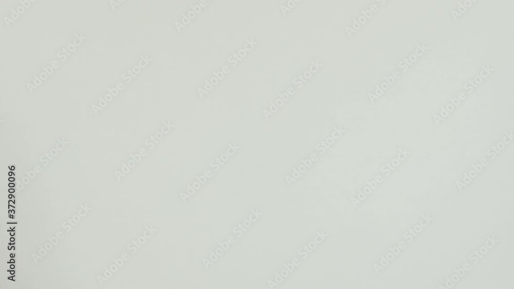 Cropped close up of african man guy male hands present give each other gift certificate card coupon voucher birthday holiday party isolated on grey gray color background in studio. Mock up copy space Cropped close up of african man guy male hands present give each other gift certificate card coupon voucher birthday holiday party isolated on grey gray color background in studio. Mock up copy space