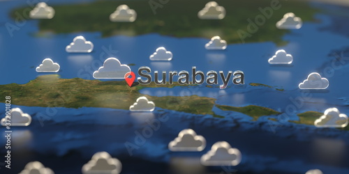Cloudy weather icons near Surabaya city on the map, weather forecast related 3D rendering