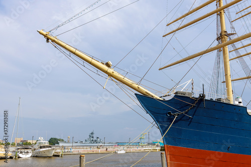 Boat in the harbor of the mainmast of in the port in the seashore