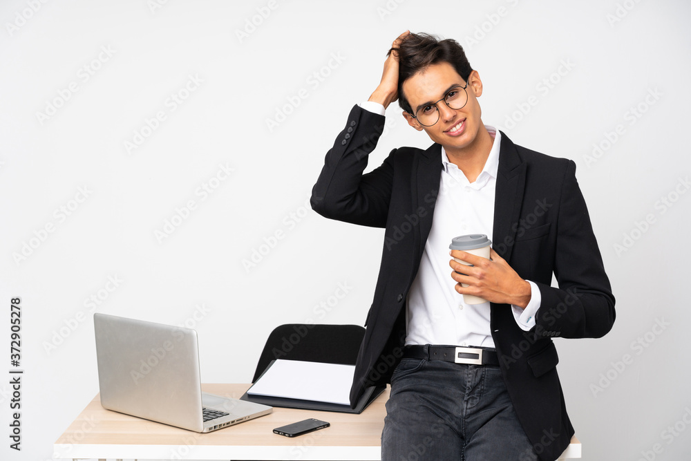 Businessman in his office over isolated white background laughing Businessman in his office over isolated white background laughing