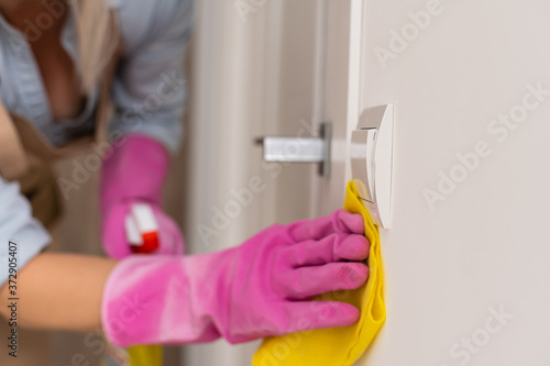 Adult woman is cleaning the apartment © Angelov