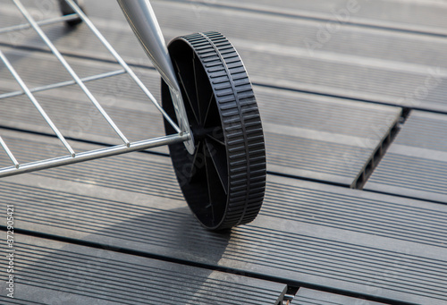plastic wheel of new barbecue close up