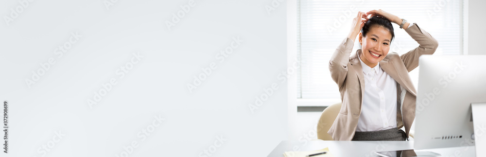 Asian business woman comb hair and smiling at camera at office Asian business woman comb hair and smiling at camera at office