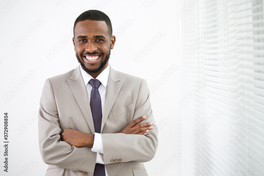 Portrait of young handsome african american businessman in the office Portrait of young handsome african american businessman in the office