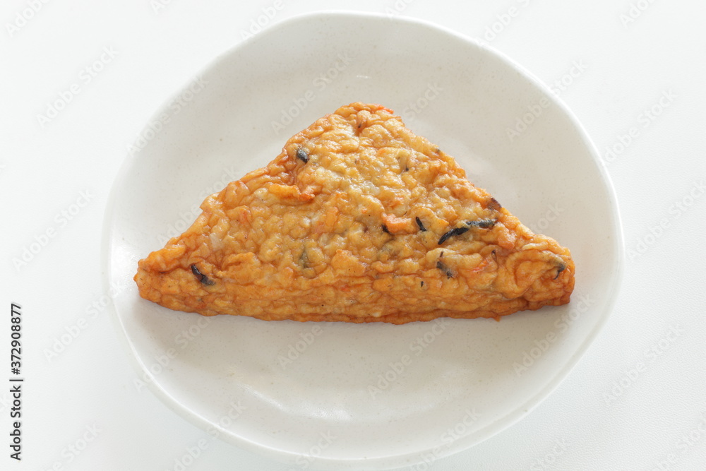 Japanese food, seaweed and carrot in fish cake on dish Japanese food, seaweed and carrot in fish cake on dish