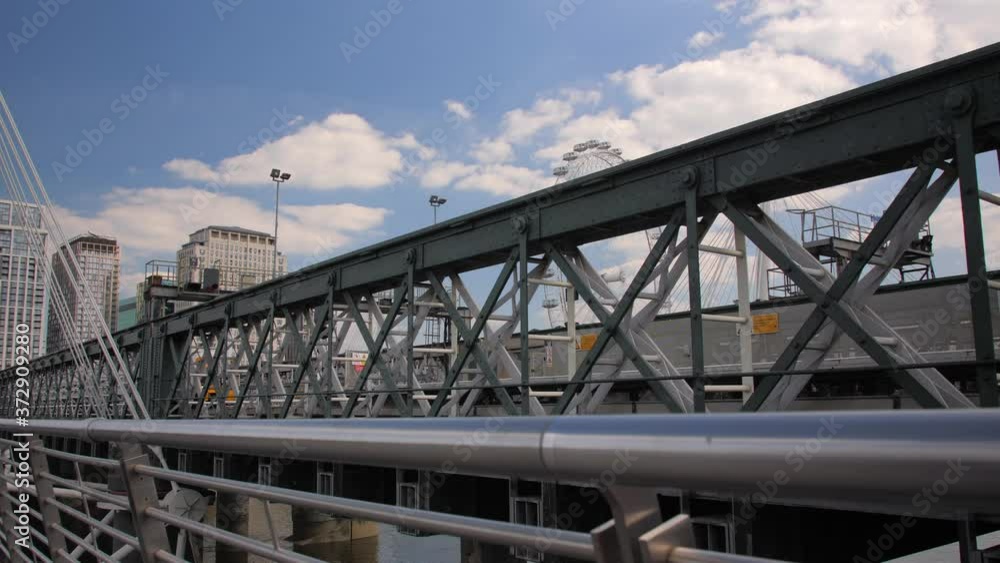 Commuter train crossing hungerford bridge london. City infrastructure. Commuter train crossing hungerford bridge london. City infrastructure.