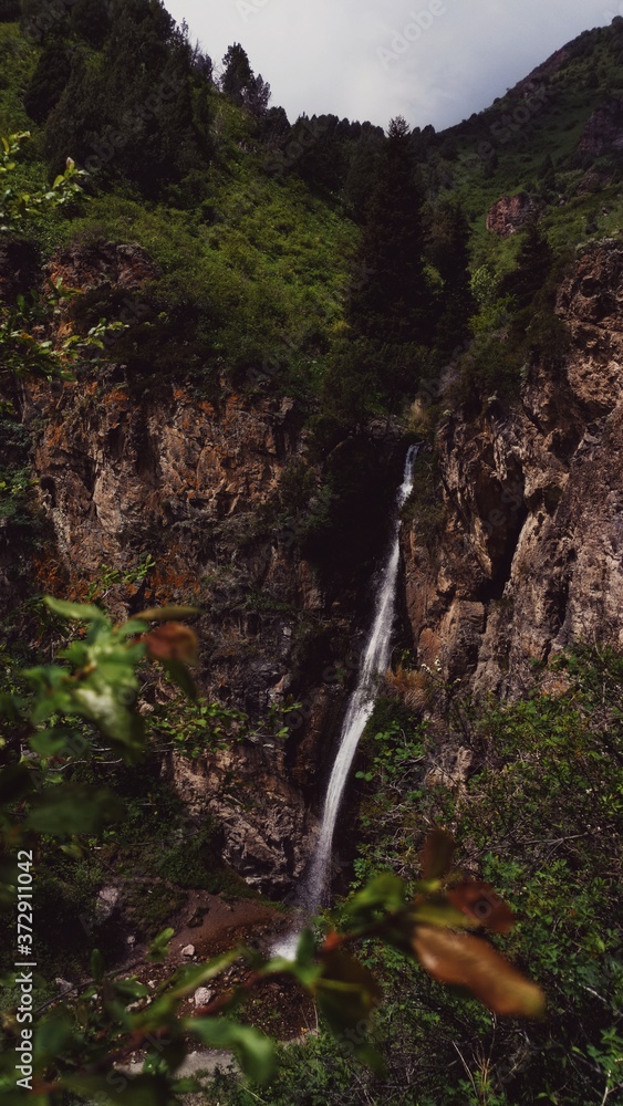 waterfall in the mountains waterfall in the mountains