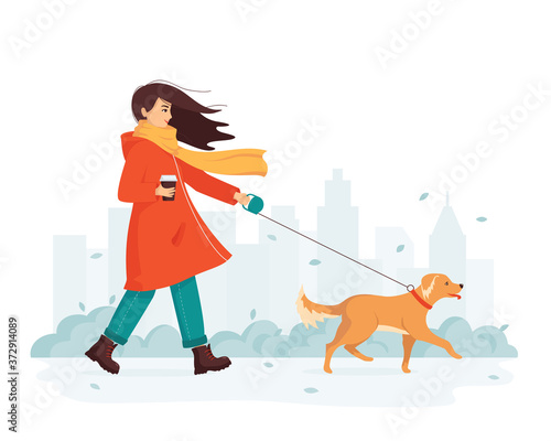 Young happy woman walks the dog in the city park. Strong wind blows. The concept of outdoor walks during the cold season. Pet is the best friend, animals from the shelter. Cartoon vector illustration