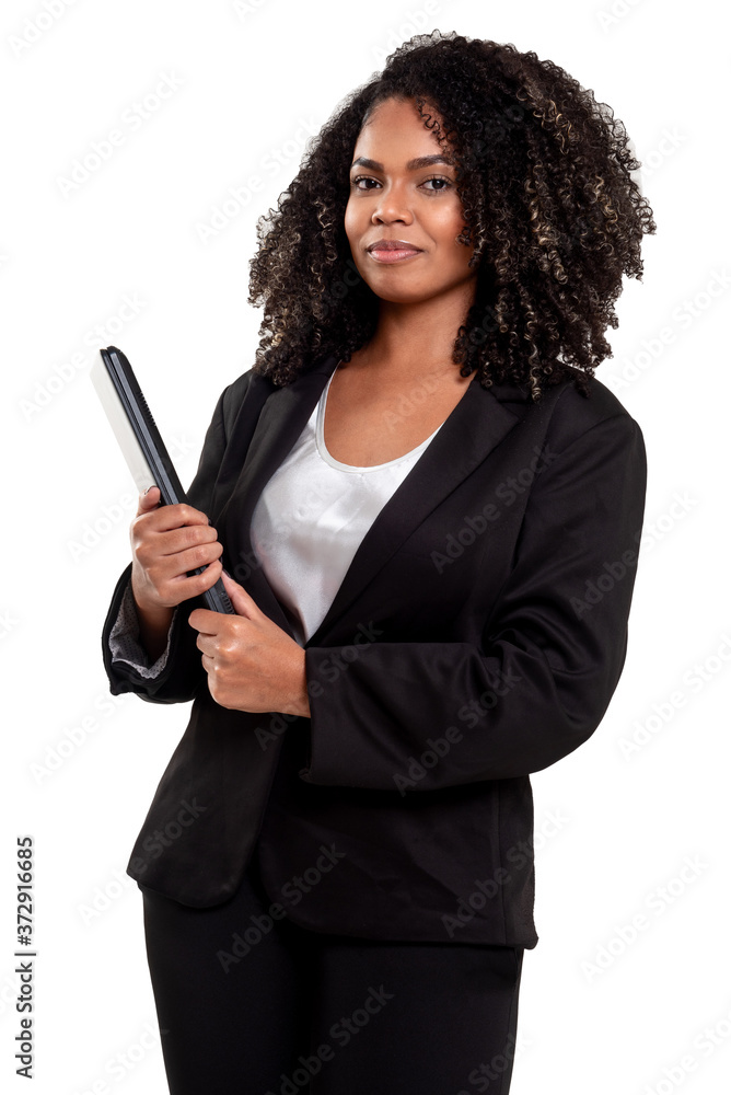 Cheerful and smiling executive black Brazilian woman isolated on white background, working with a notebook Cheerful and smiling executive black Brazilian woman isolated on white background, working with a notebook