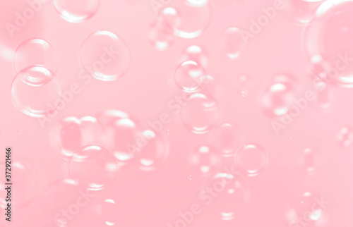 Beautiful pink abstract background  Clear soap bubbles float in the air.