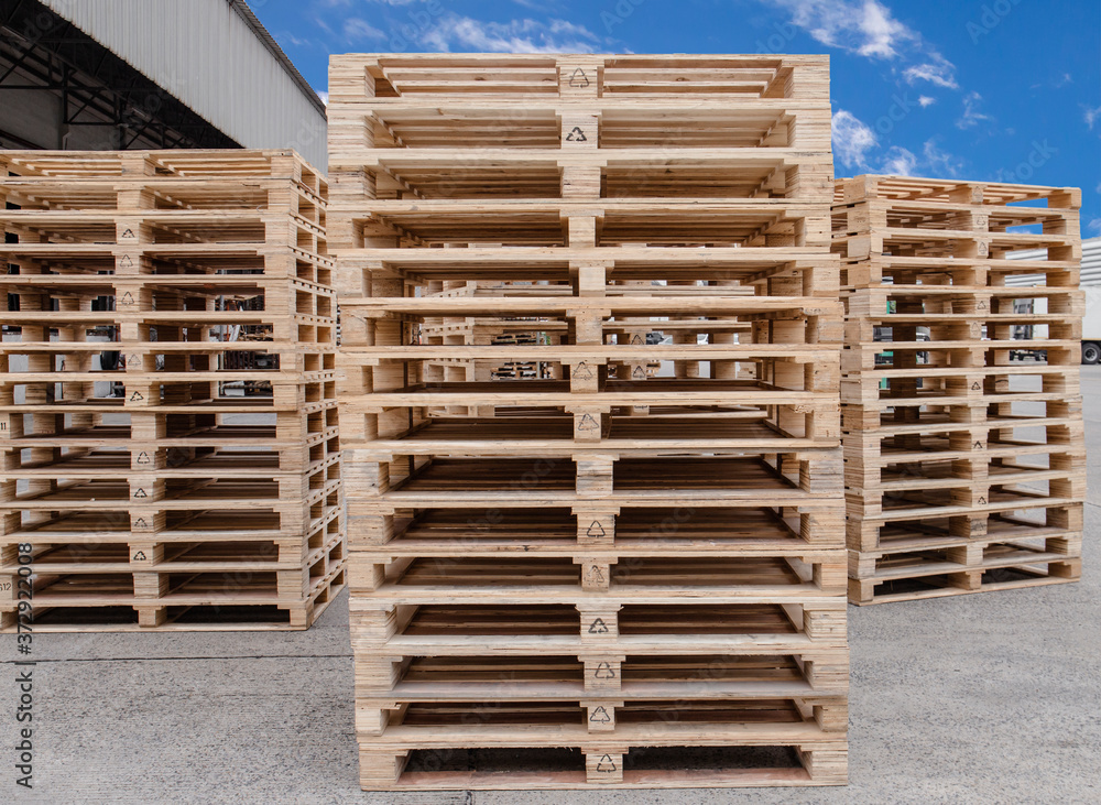Stack of wooden pallets storage at manufacturing factory warehouse. Stack of wooden pallets storage at manufacturing factory warehouse.